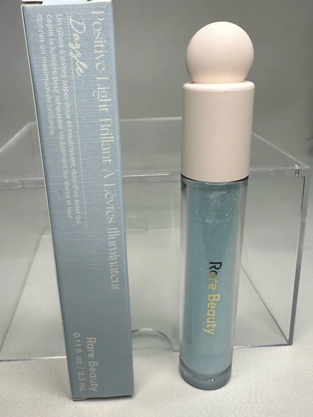 Rare Beauty Positive Light Luminizing Lip Gloss — Shimmering Blue